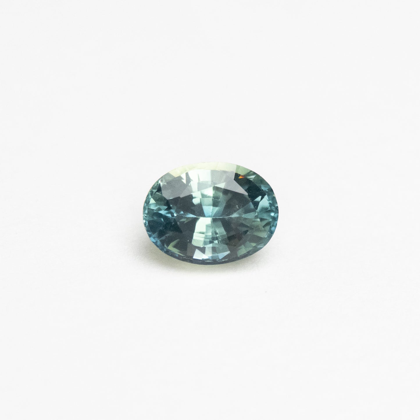 0.74ct 5.95x4.45x3.31mm Light Teal Oval Brilliant Sapphire EGEM-19