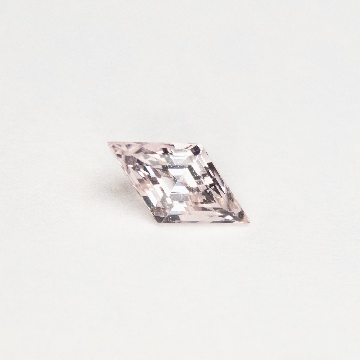 0.88ct 9.25x5.02x3.69mm Peach Step Cut Lozenge Sapphire EGEM-15