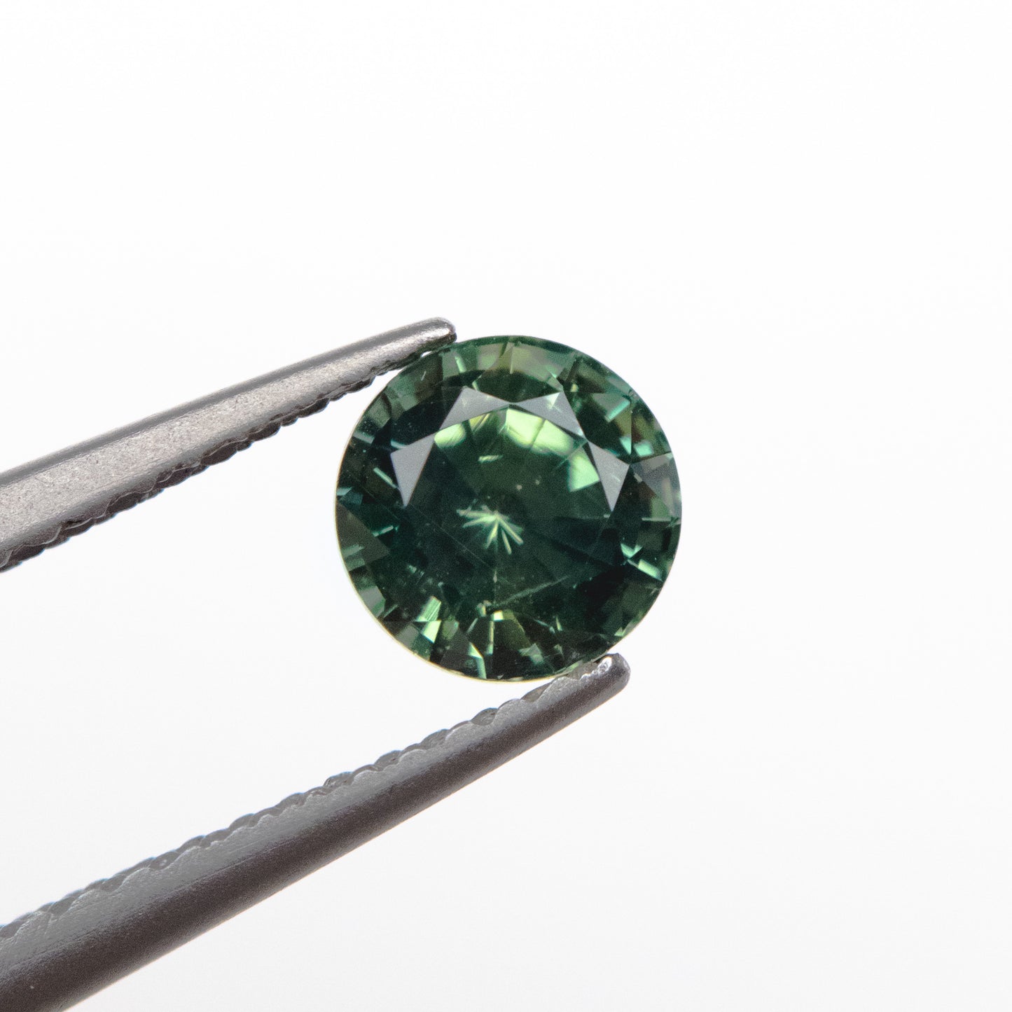 1.03ct 5.57x5.56x4.08mm Green Round Brilliant Sapphire EGEM-34