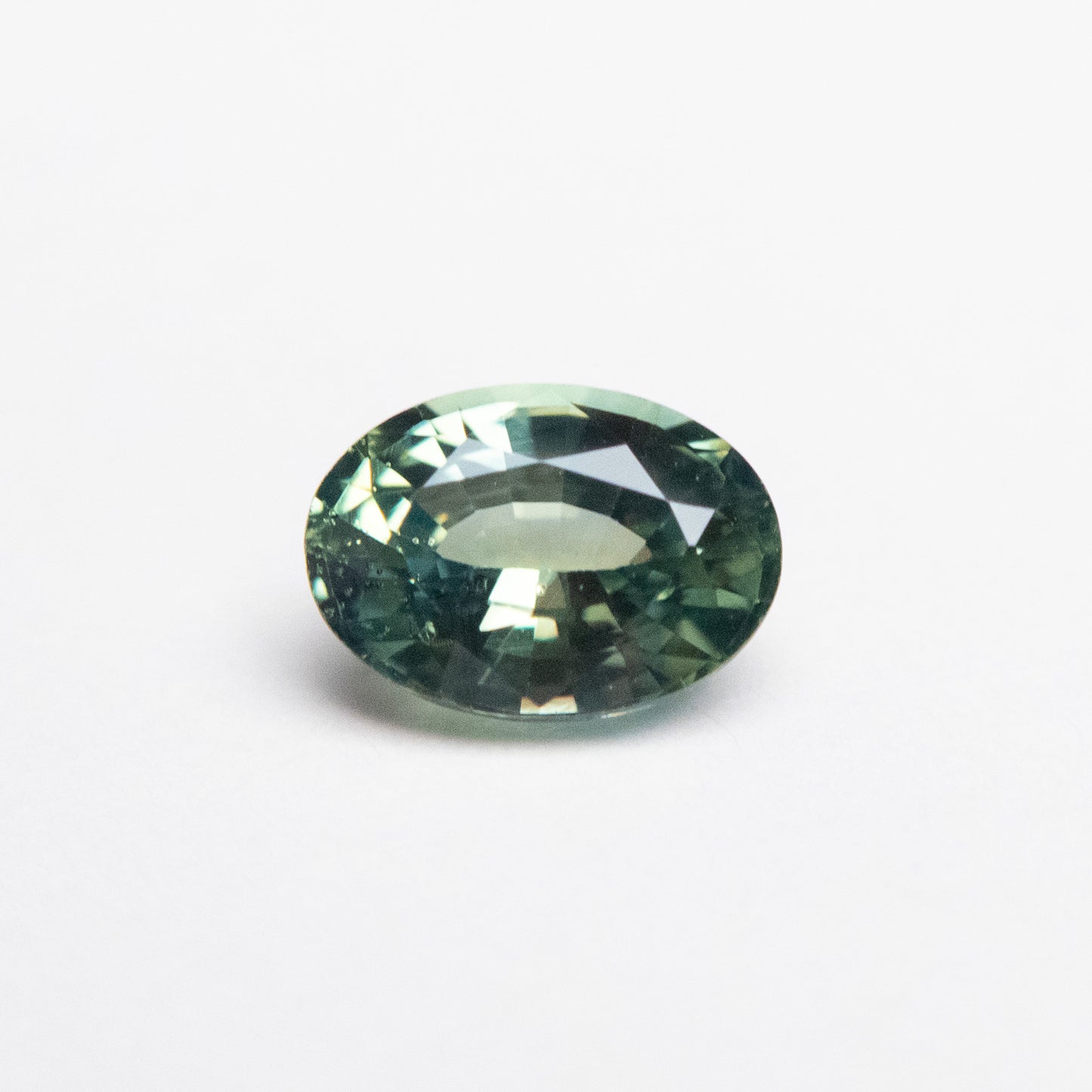 1.09ct 6.10x5.09x3.48mm Light Teal Oval Brilliant Sapphire EGEM-26