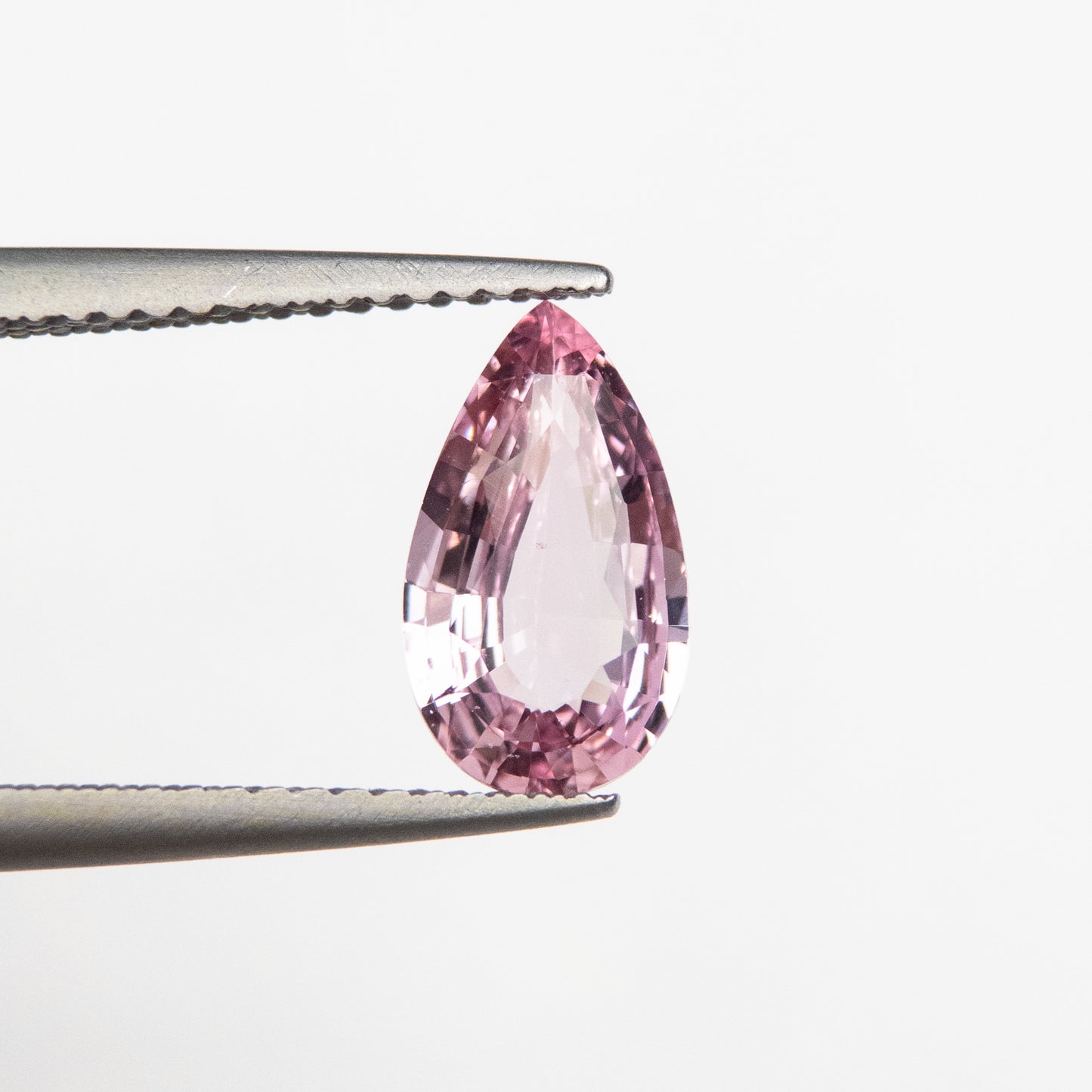 1.69ct 10.54x6.04x3.27mm Orangey Pink Pear Brilliant Sapphire EGEM-11