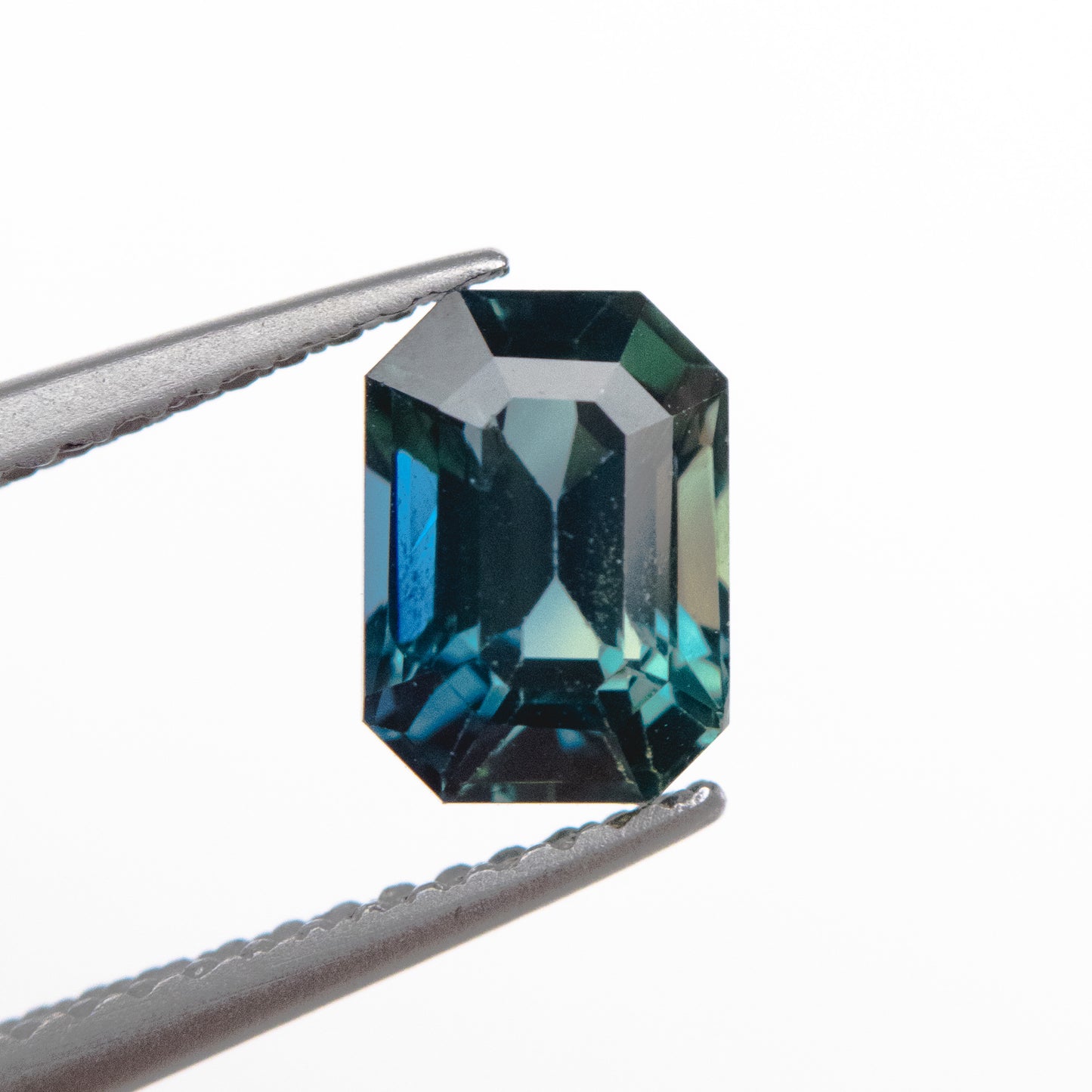 1.78ct 7.41x5.31x5.53mm Teal Cut Corner Rectangle Step Cut Sapphire EGEM-38