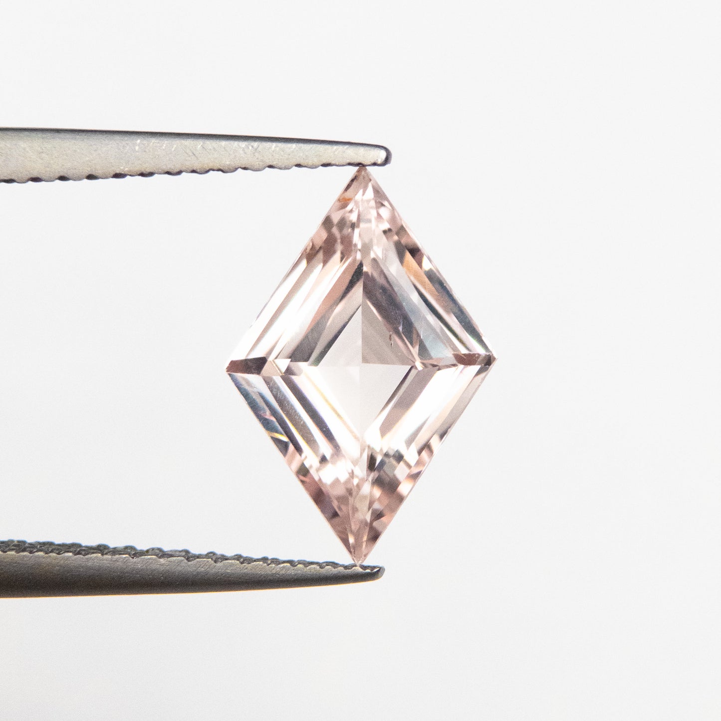 2.06ct 12.33x8.45x3.86mm Peach Step Cut Lozenge Sapphire EGEM-16