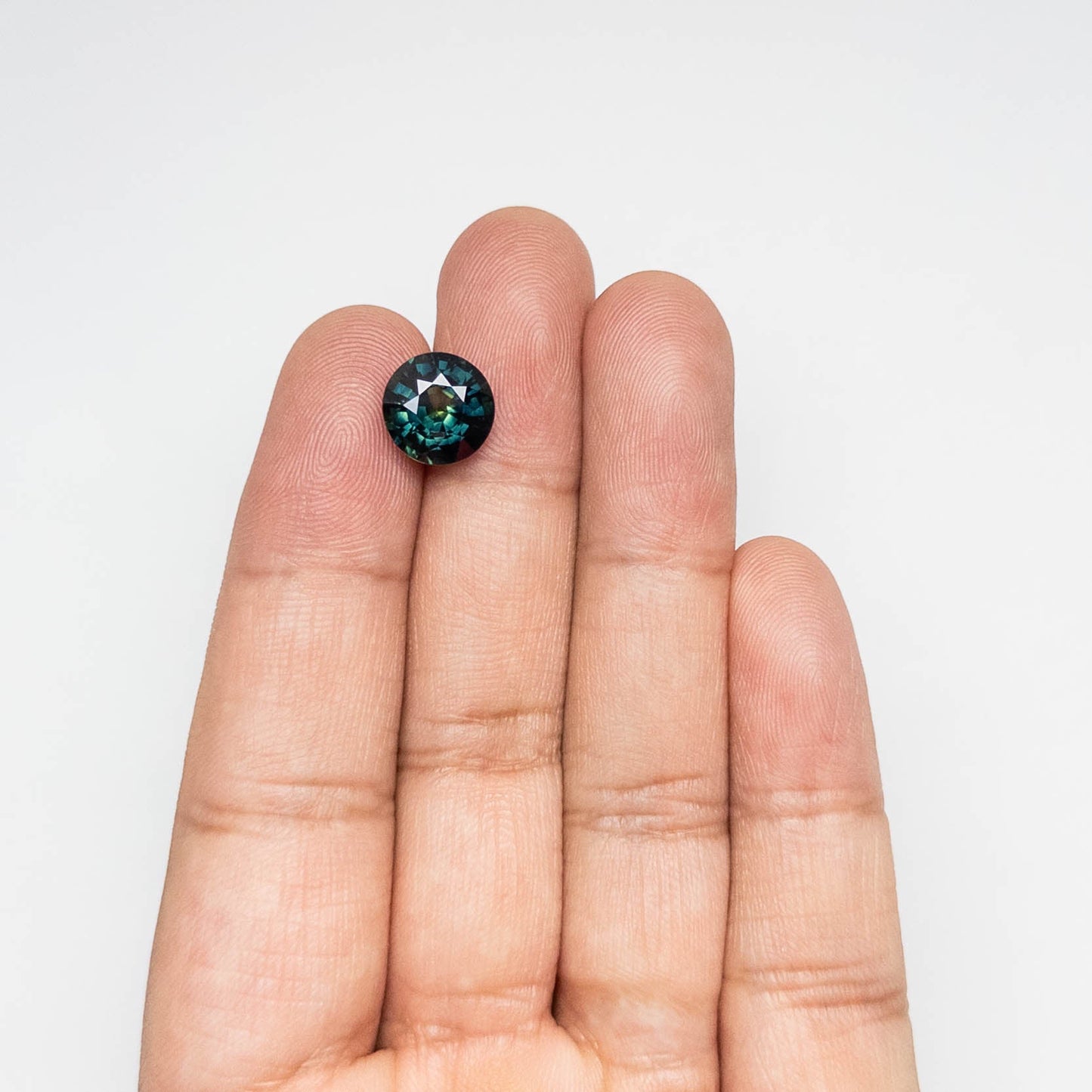 5.07ct 10.21x10.11x6.257mm Round Brilliant Sapphire 23434-08