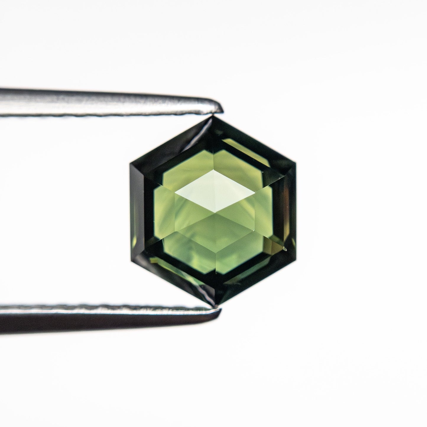 1.69ct 7.61x6.64x3.84mm Hexagon Step Cut Sapphire 23476-12