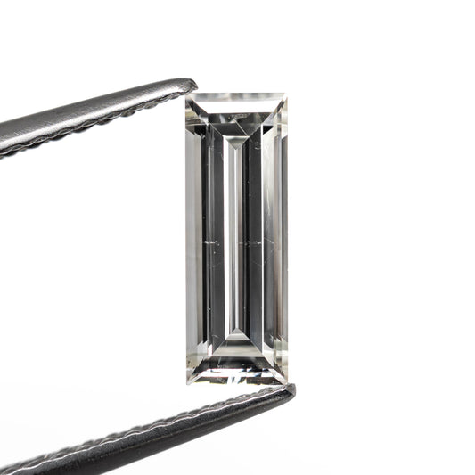 0.77ct 10.02x3.50x2.24mm SI1 J Baguette Step Cut 24699-01