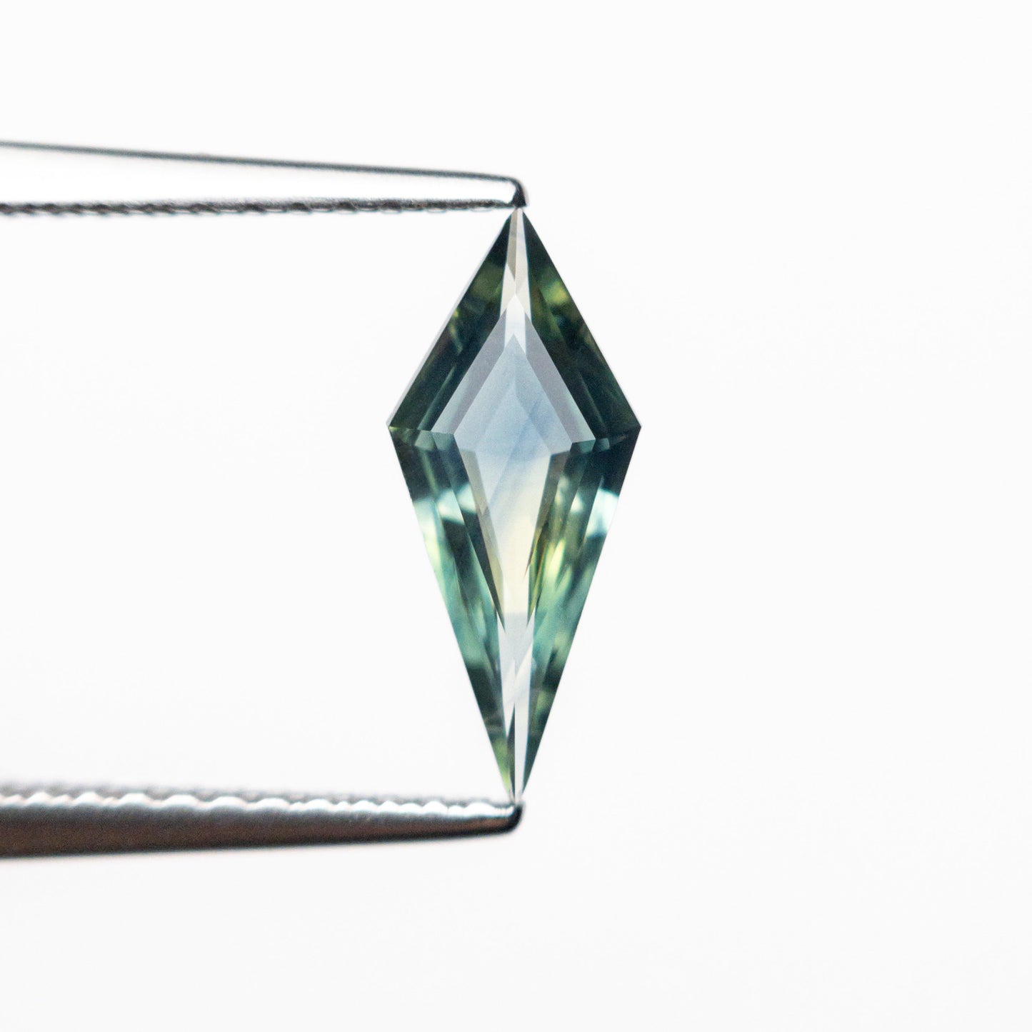 0.70ct 11.20x4.81x2.36mm Kite Step Cut Sapphire 25740-09