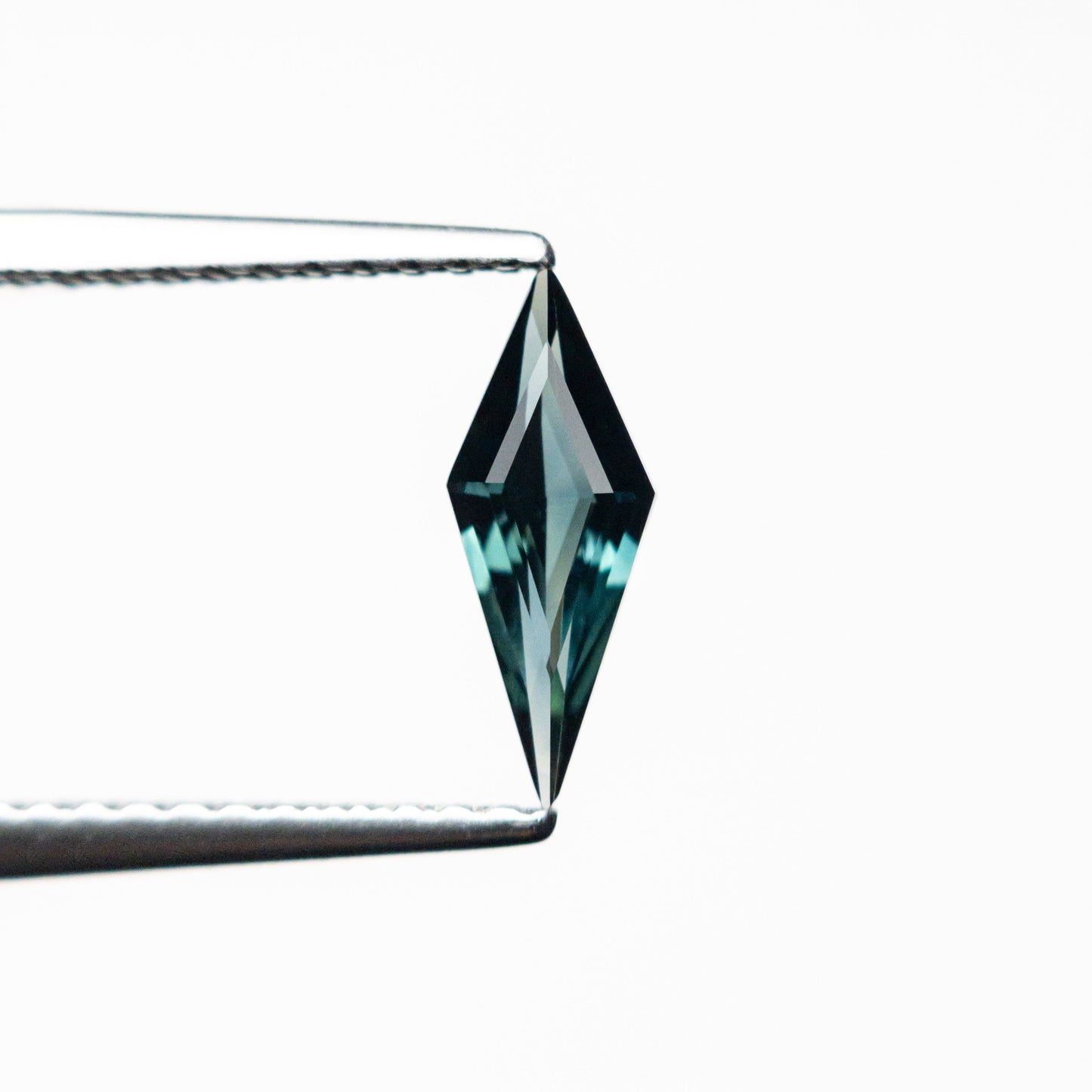 0.46ct 9.62x3.77x2.27mm Kite Step Cut Sapphire 25740-17