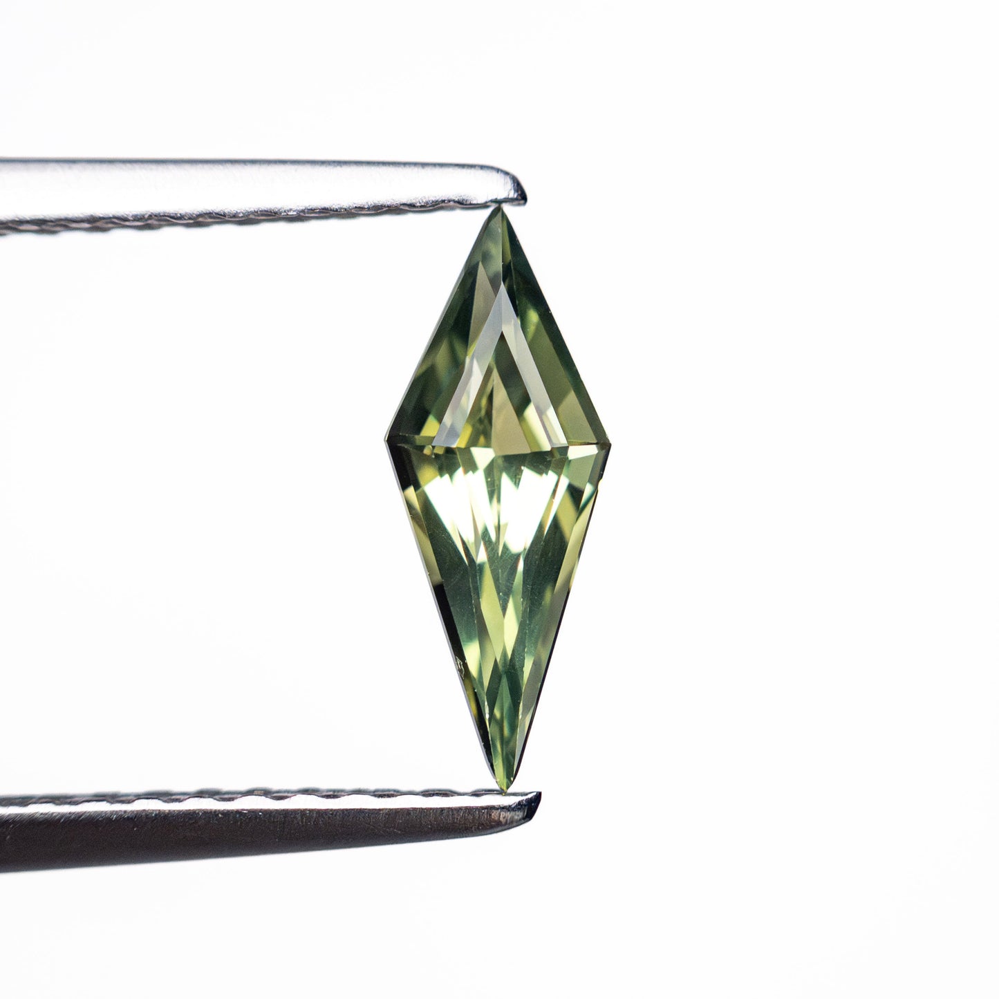 0.51ct 9.76x3.78x2.66mm Kite Step Cut Sapphire 25740-22