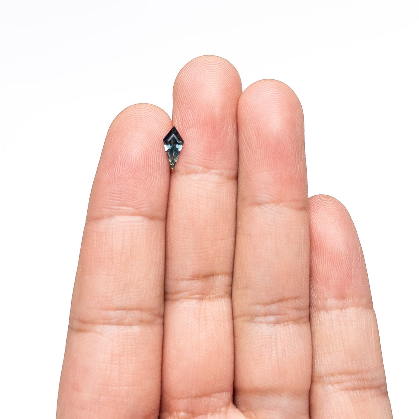 0.59ct 9.68x4.61x2.66mm Kite Step Cut Sapphire 25740-25