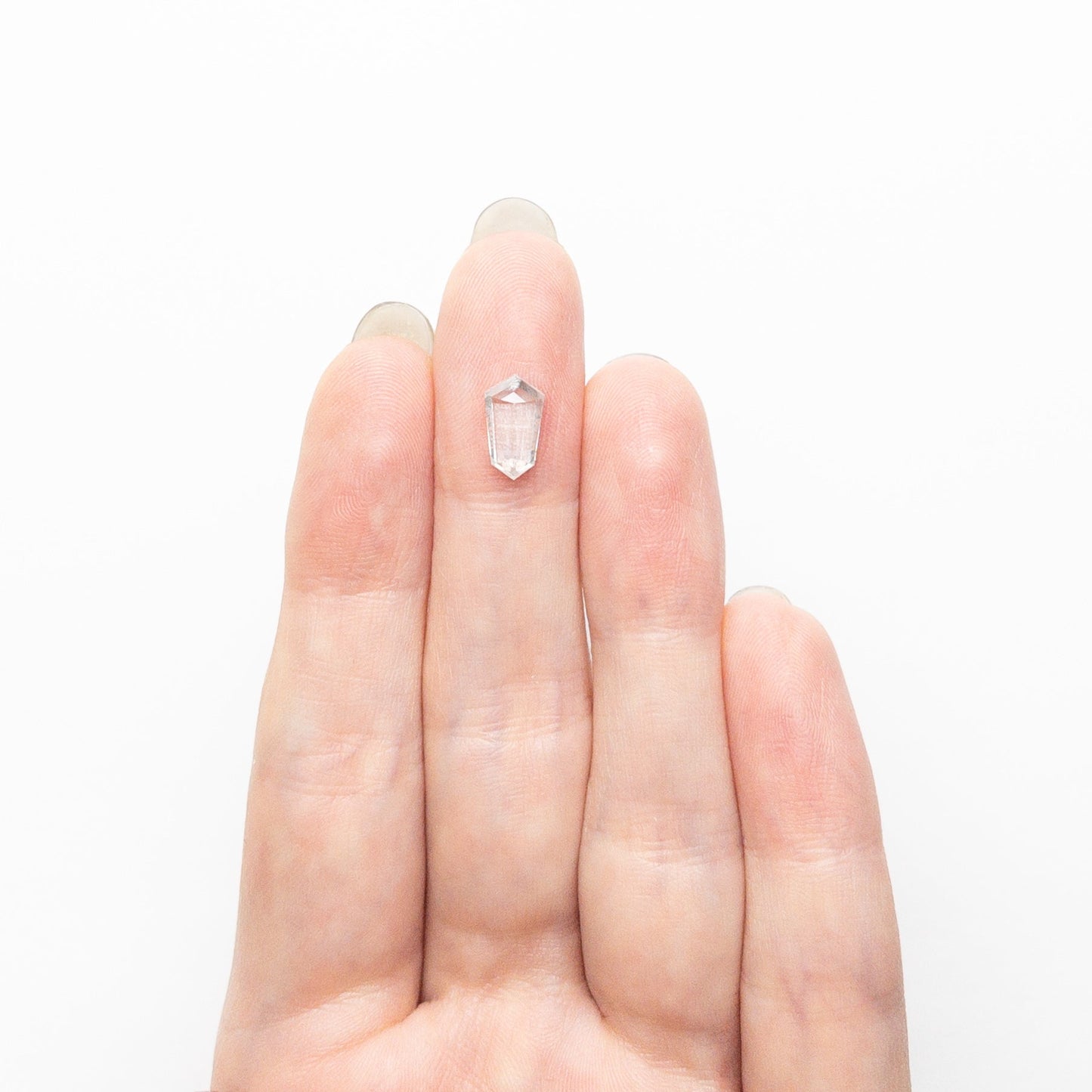 1.47ct 9.65x5.40x3.34mm Shield Step Cut 25807-34