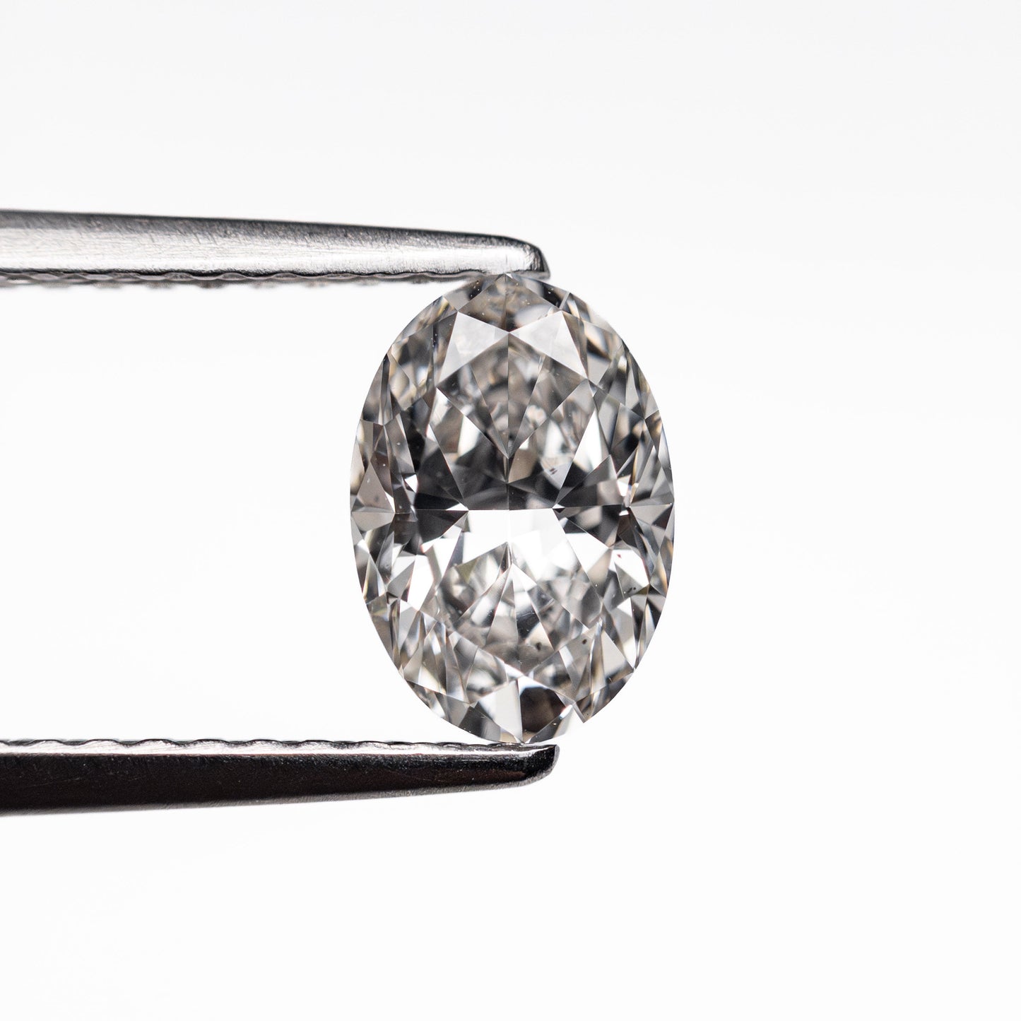 0.90ct 7.60x5.24x3.38mm SI2 H Oval Brilliant 🇨🇦 26121-10