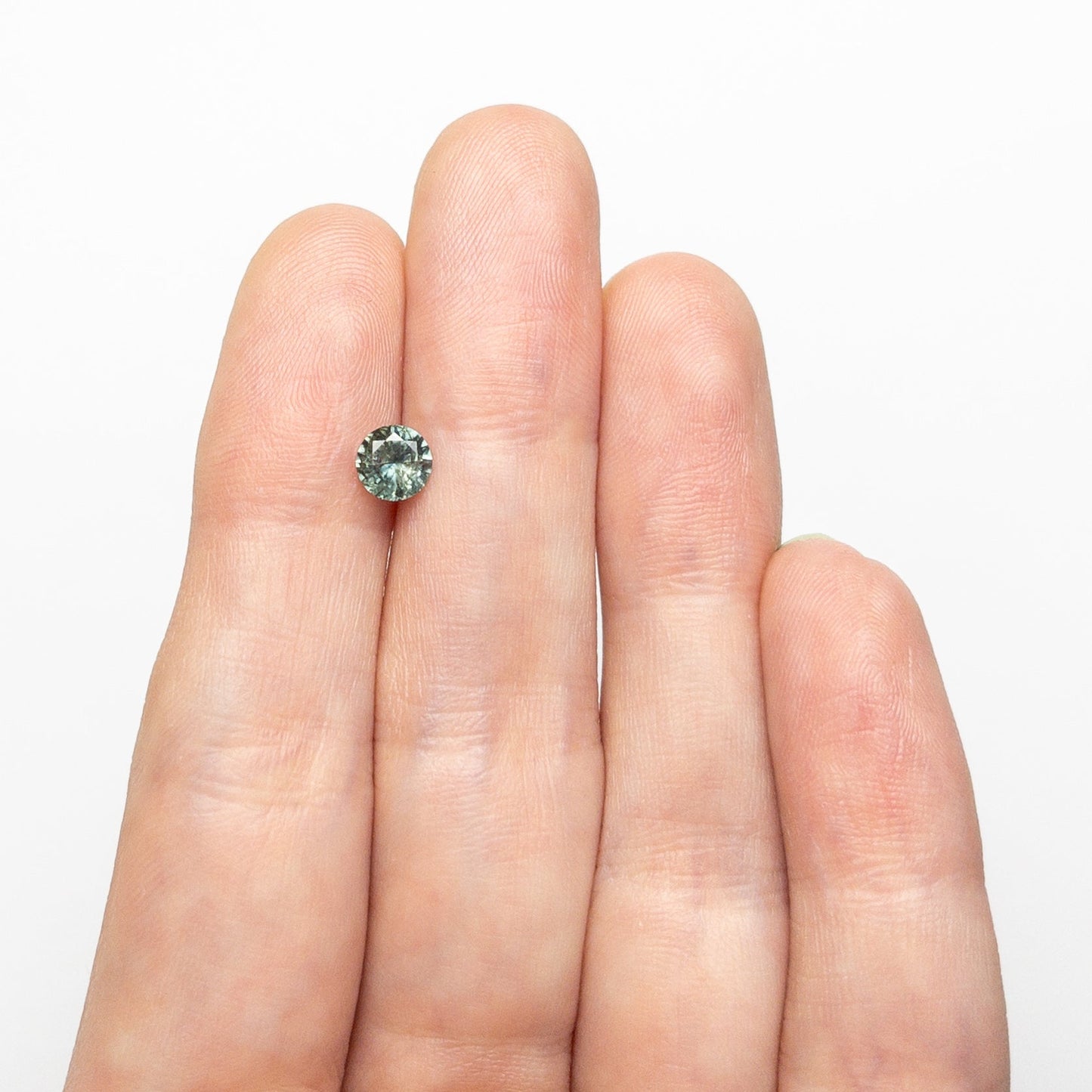 0.59ct 5.17x5.13x3.10mm Round Brilliant Sapphire 26556-21