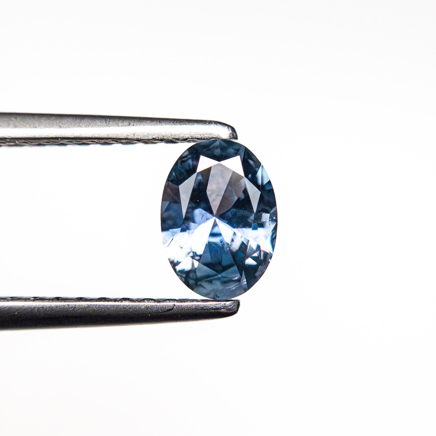 0.59ct 6.10x4.44x2.79mm Oval Brilliant Sapphire 26667-04