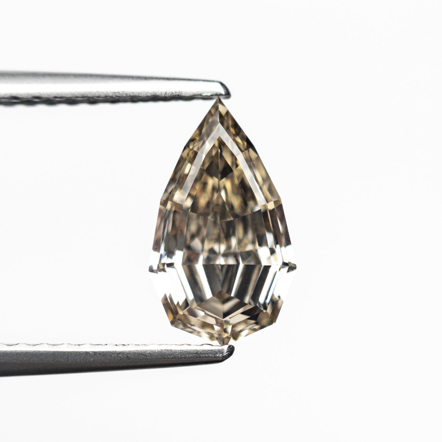 1.46ct 10.11x5.96x3.56mm VS1 C6 Geo Pear Step Cut 27082-03