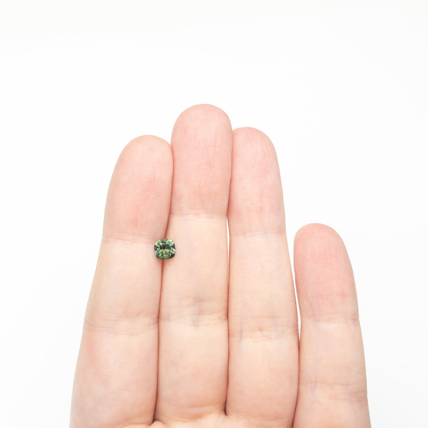 0.65ct 5.06x5.00x3.28mm Cushion Brilliant Sapphire 27336-15