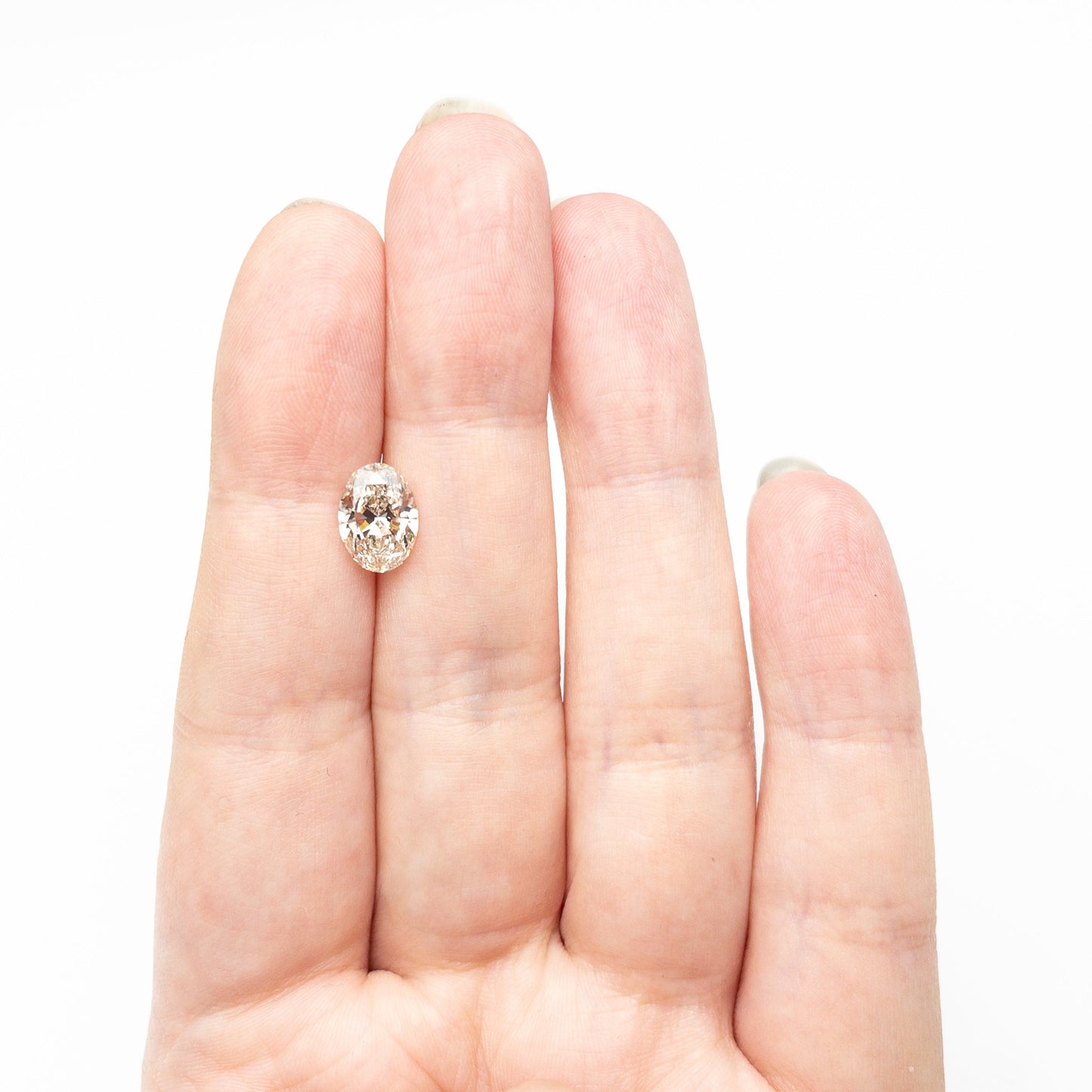 2.01ct 9.74x7.01x4.32mm SI1 O-P Champagne Oval Brilliant 27365-01