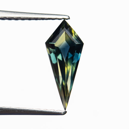 0.99ct 11.62x4.92x3.08mm Kite Step Cut Sapphire 27713-01