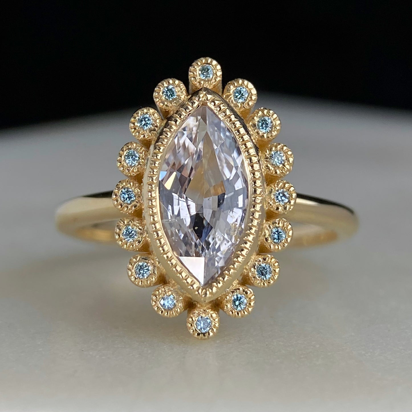 Marquise White Sapphire Miligrain Accents Blue Diamond Halo Sunburst Ring 14K yellow 