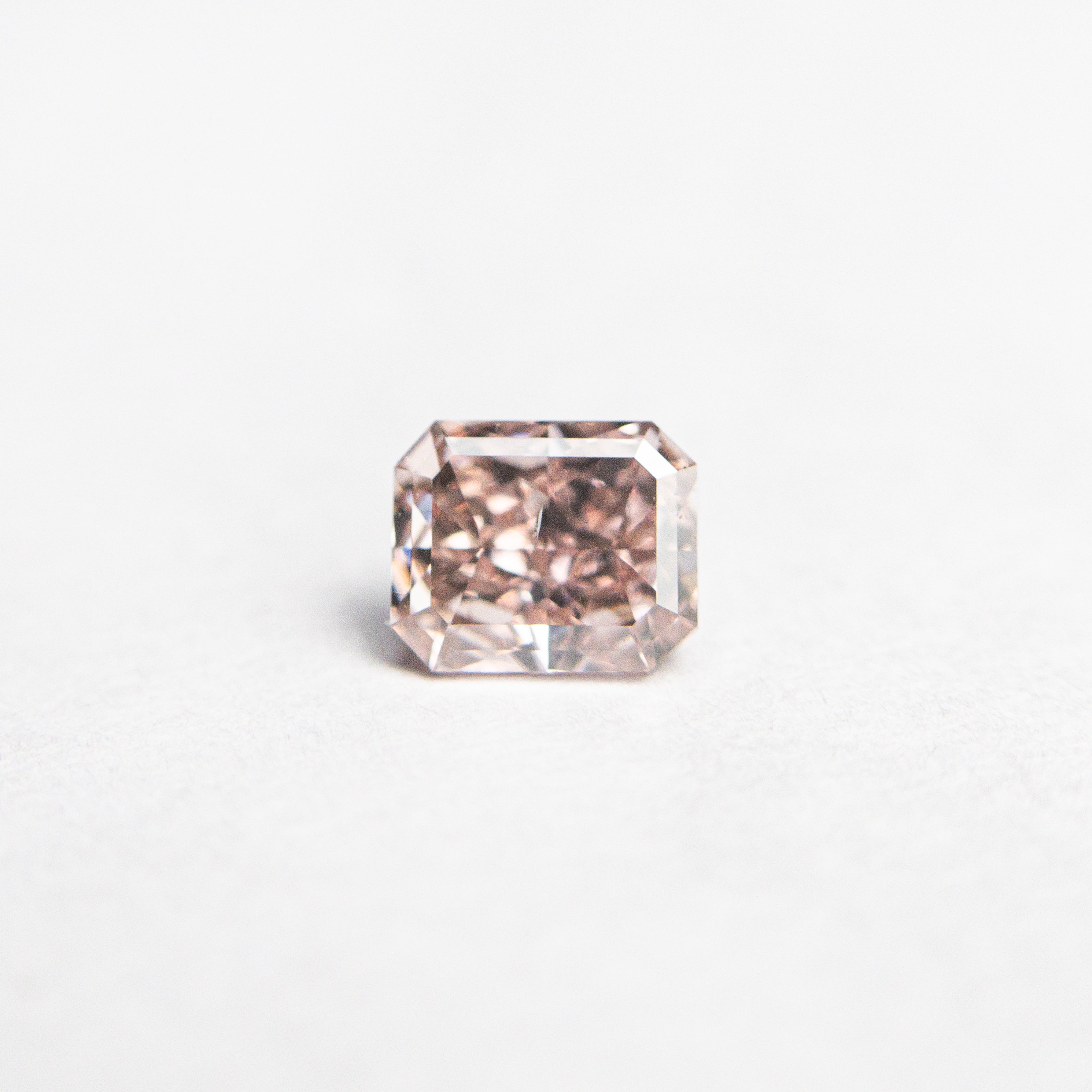 0.36ct 4.46x3.68x2.31mm GIA SI1 Fancy Orangy Pink Cut Corner