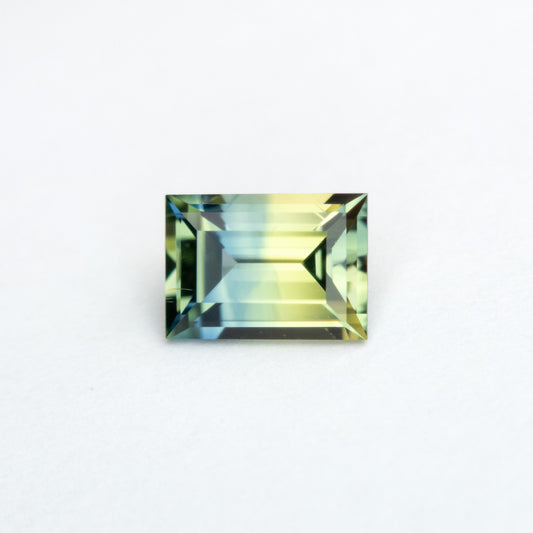 0.59ct 5.54x3.95x2.65mm Parti Blue-Green Step Cut Baguette Sapphire EGEM-62