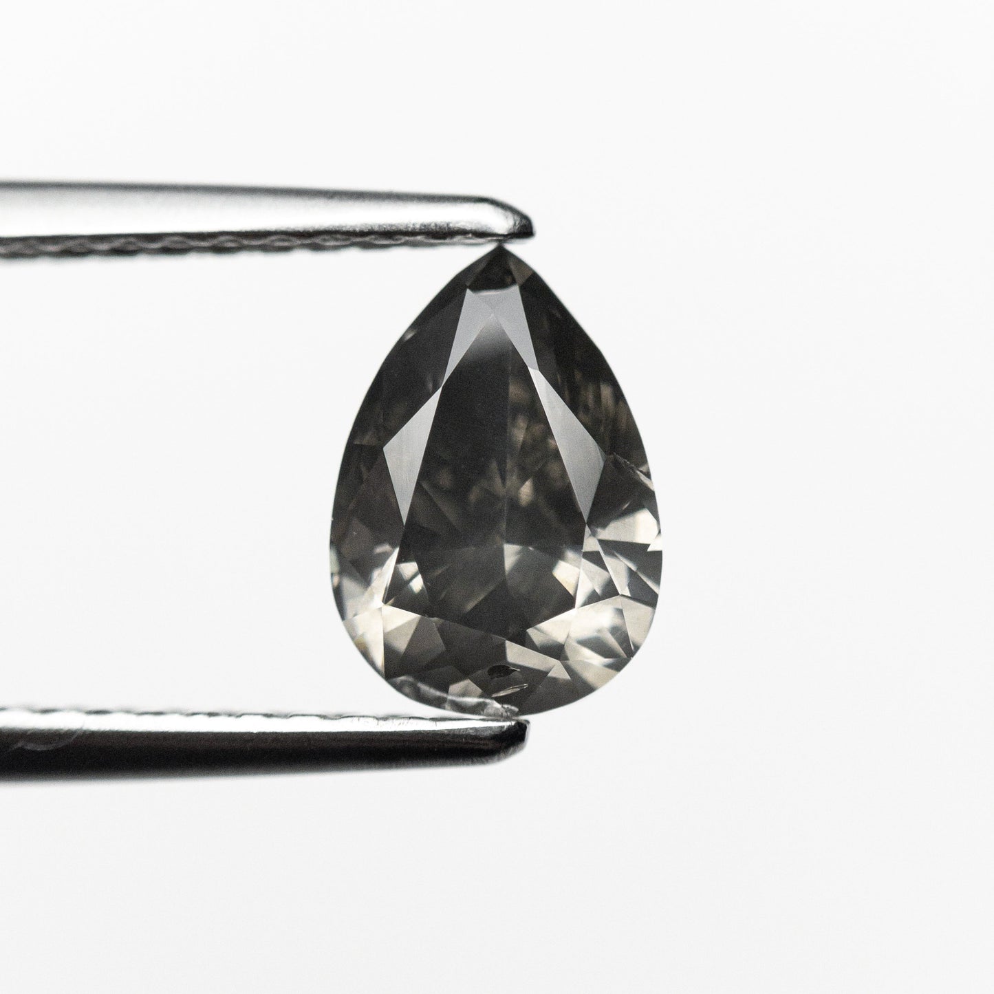 1.01ct 7.83x5.42x3.38mm Fancy Dark Grey Pear Brilliant 19913-01