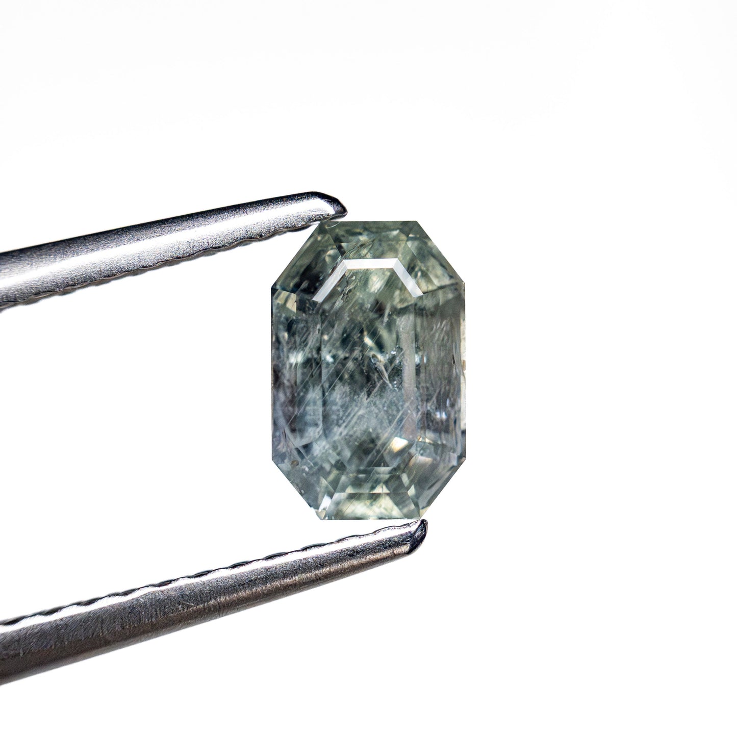 1.27ct 6.75x4.40x4.15mm Cut Corner Rectangle Step Cut Sapphire 23699-17