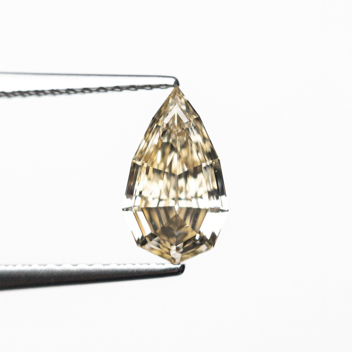 1.14ct 9.85x5.82x3.09mm VS2 C4 Geo Pear Step Cut 🇿🇦 26119-08