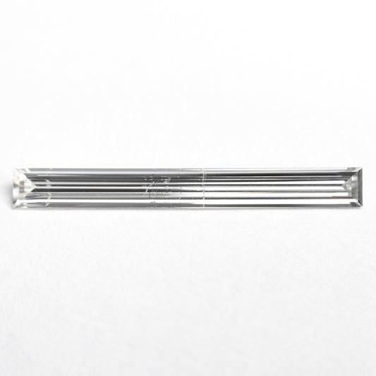 0.52ct 19.44x2.17x1.09mm SI2 E Baguette Step Cut 26545-01