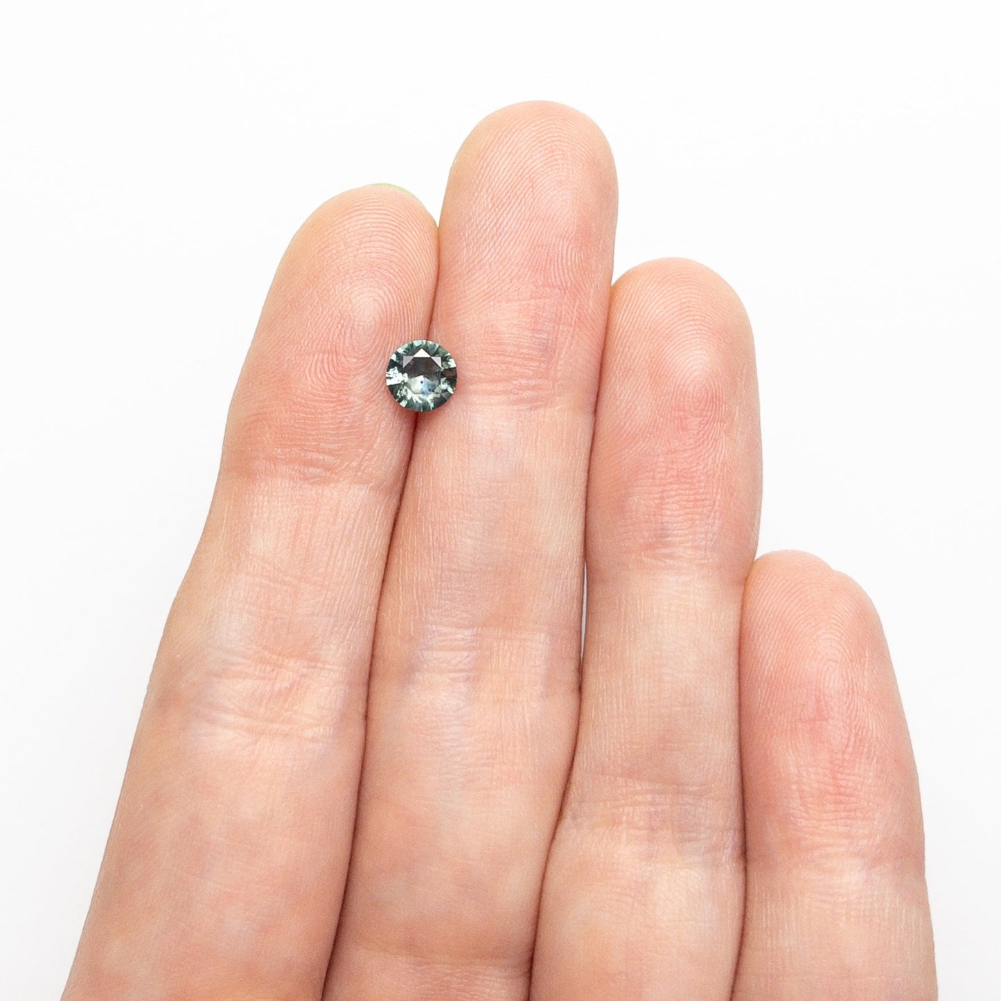 0.58ct 5.27x5.23x2.83mm Round Brilliant Sapphire 26556-15