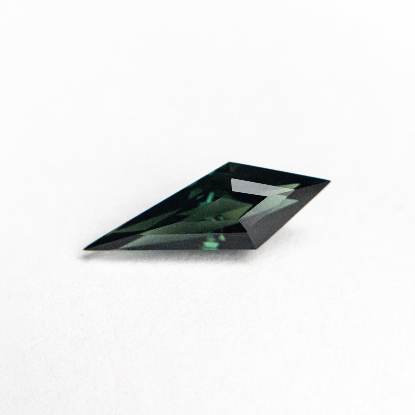 0.94ct 12.10x4.35x3.33mm Kite Step Cut Sapphire 26633-02