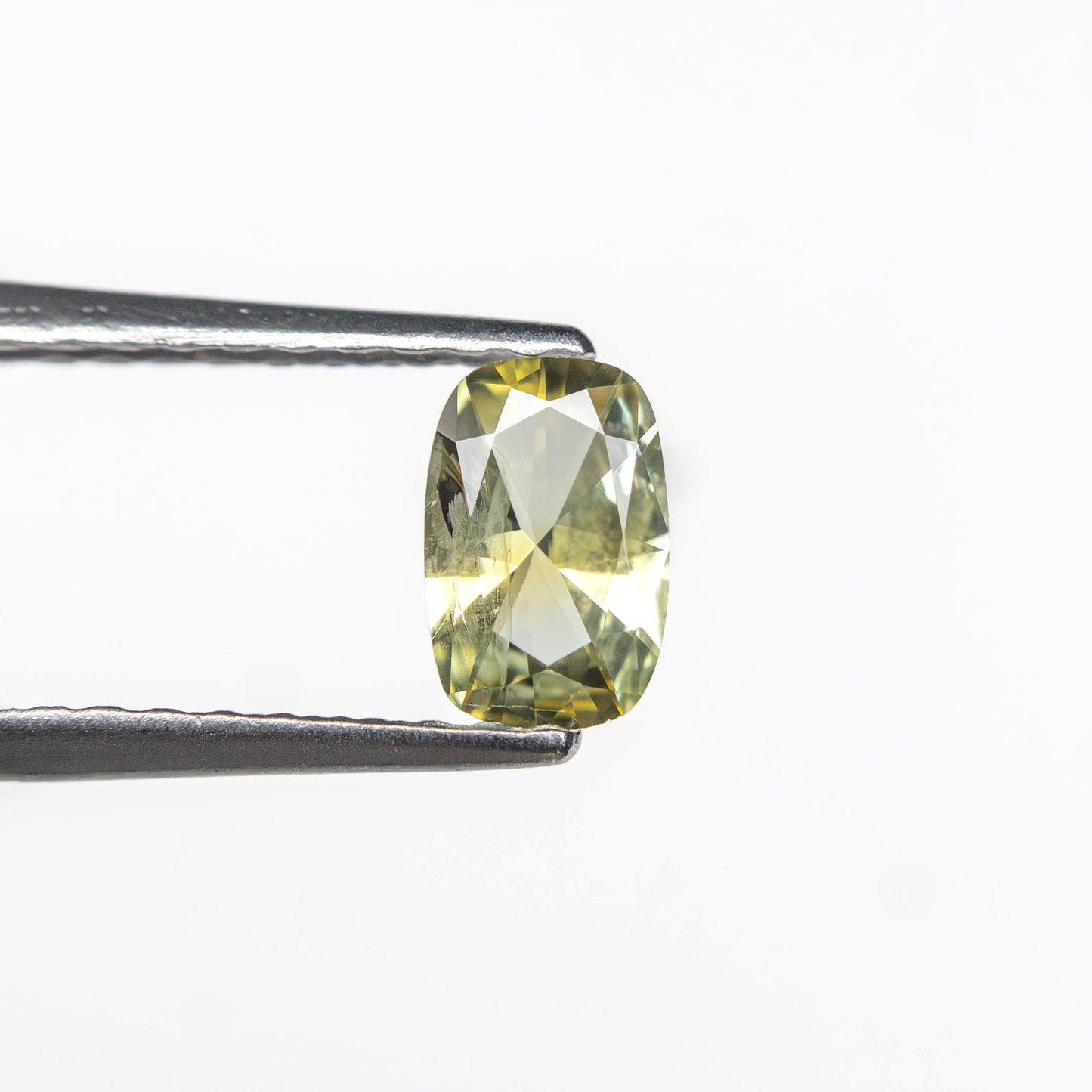 0.36ct 5.46x3.59x2.23mm Cushion Brilliant Sapphire 26766-09