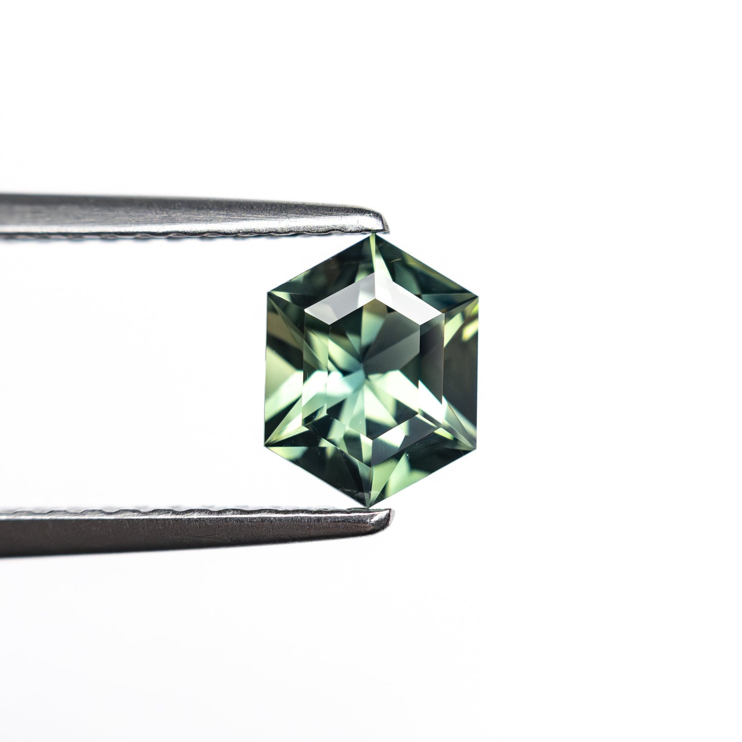 0.81ct 6.77x5.23x3.14mm Hexagon Step Cut Sapphire 27336-03