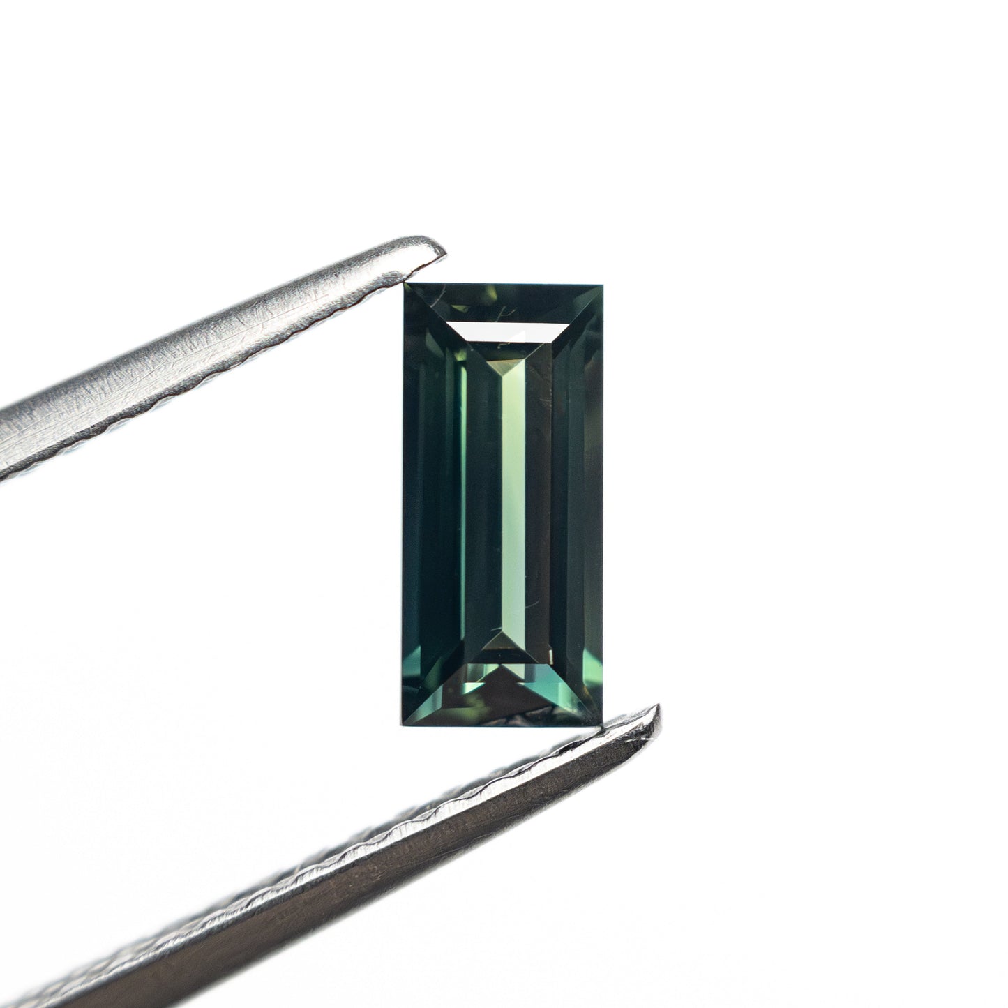 0.71ct 7.14x3.43x2.45mm Rectangle Step Cut Sapphire 27336-46