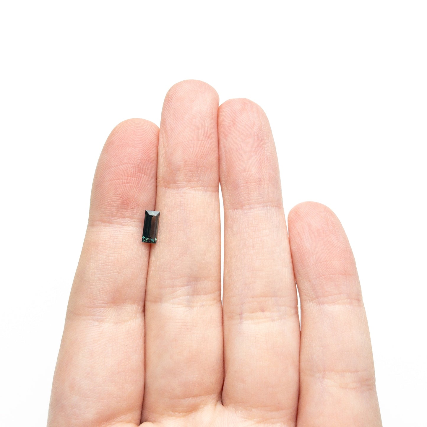 0.71ct 7.14x3.43x2.45mm Rectangle Step Cut Sapphire 27336-46