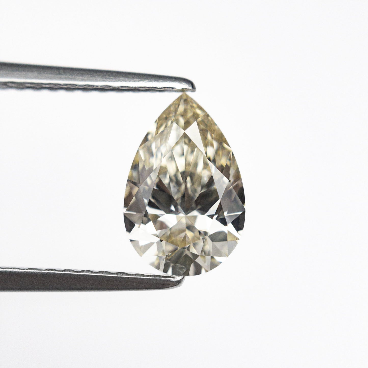 1.20ct 9.20x5.99x3.69mm VS2 O-P Pear Brilliant 27376-05