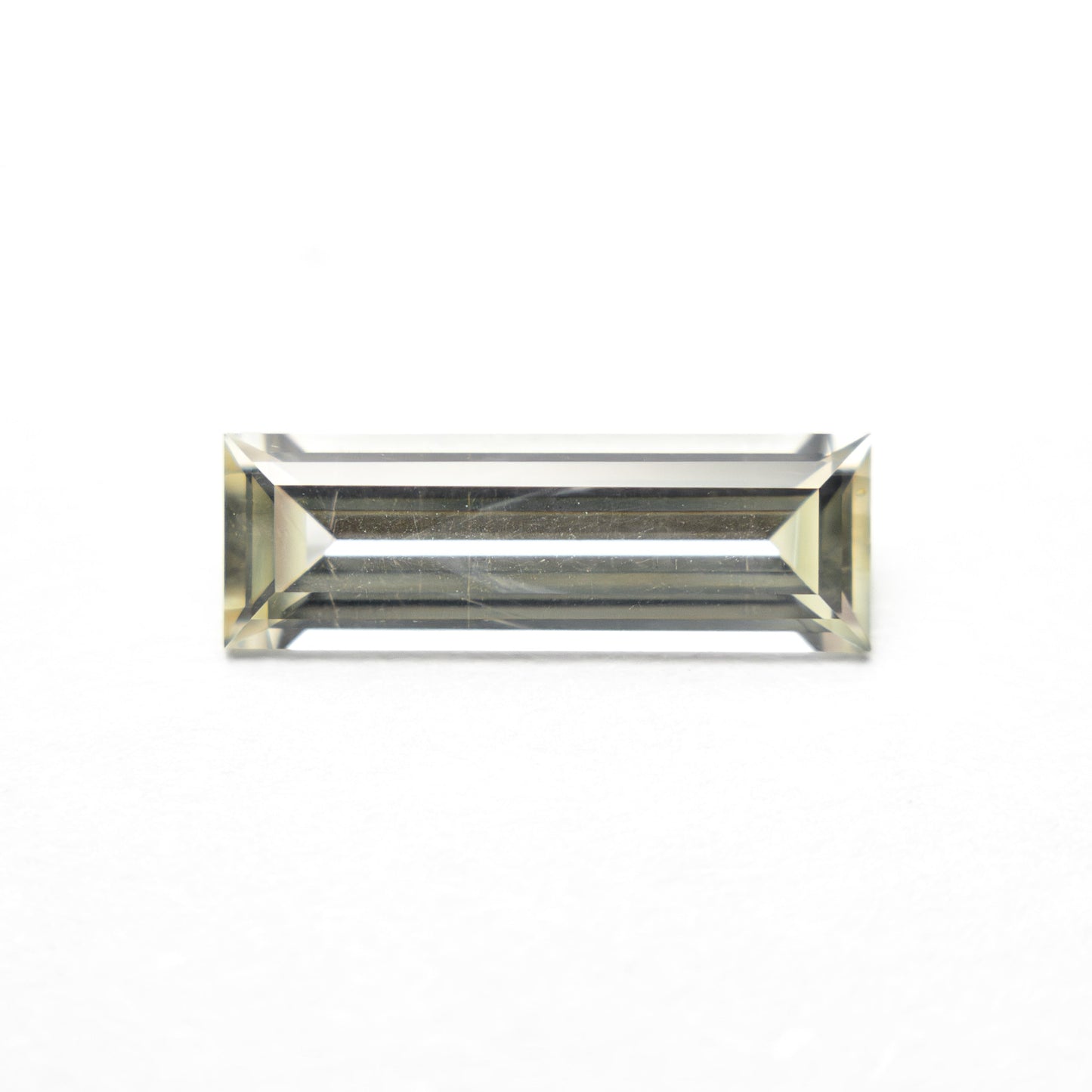 0.84ct 9.95x3.36x2.17mm Baguette Step Cut Sapphire 27719-01