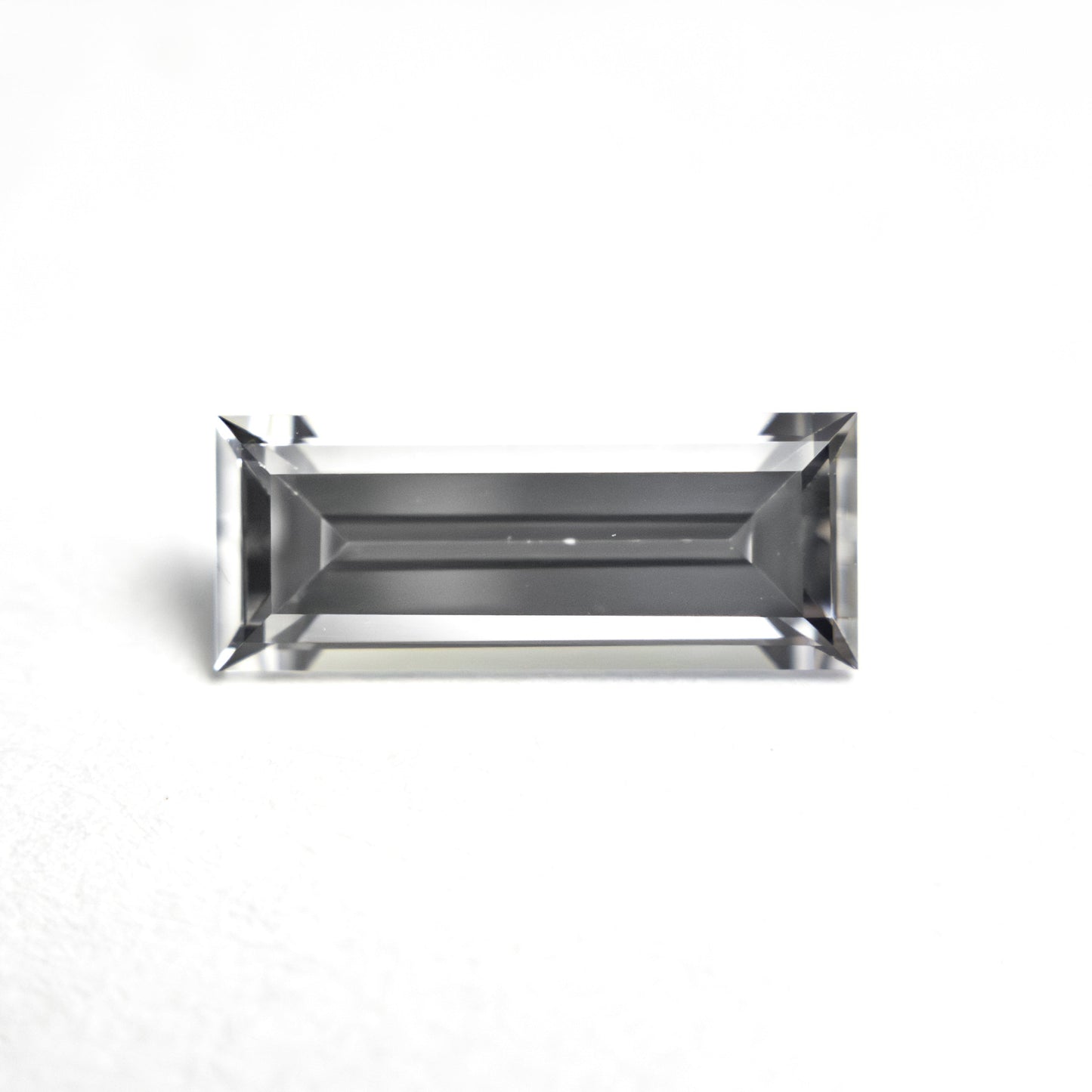 1.06ct 9.53x3.81x2.64mm Baguette Step Cut Sapphire 27720-07