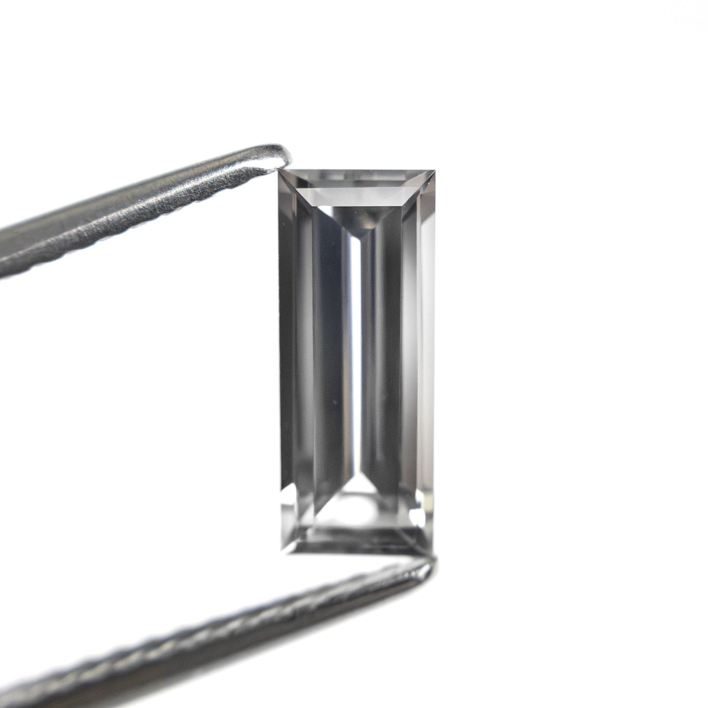 1.06ct 9.53x3.81x2.64mm Baguette Step Cut Sapphire 27720-07
