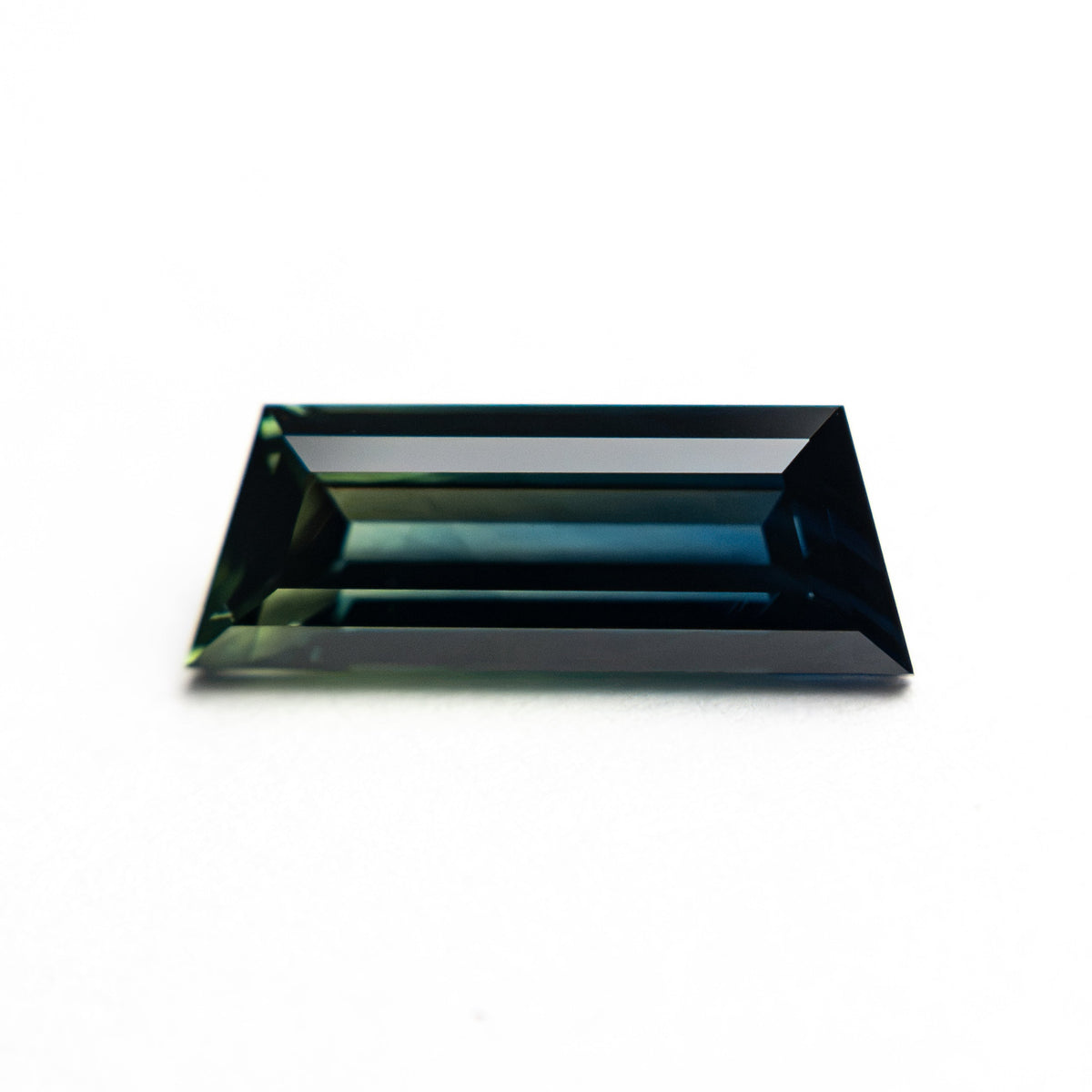 1.31ct 10.46x3.86x2.76mm Trapezoid Step Cut Sapphire 27766-11