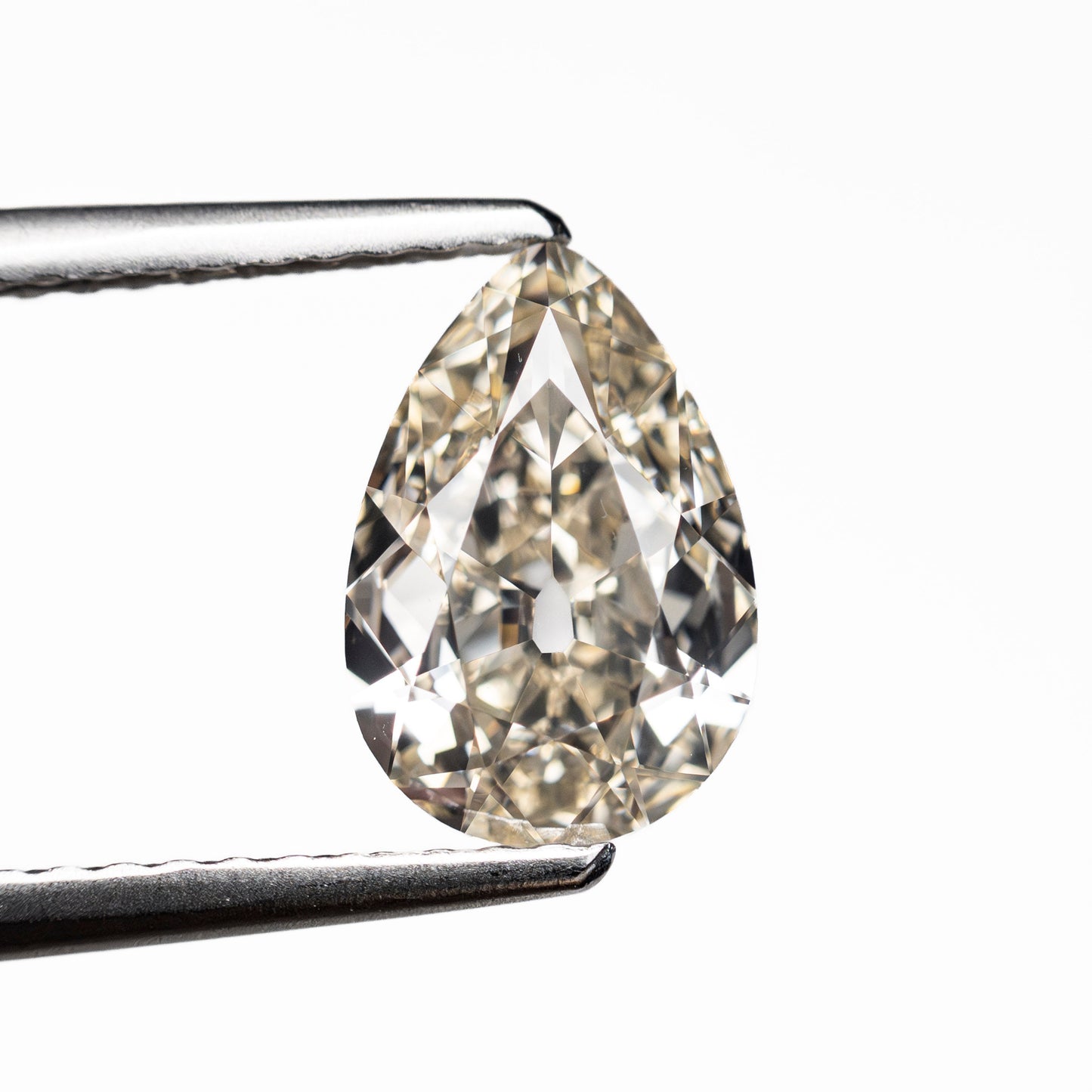 1.28ct 9.24x6.28x3.17mm GIA VVS2 M Pear Brilliant 28021-01
