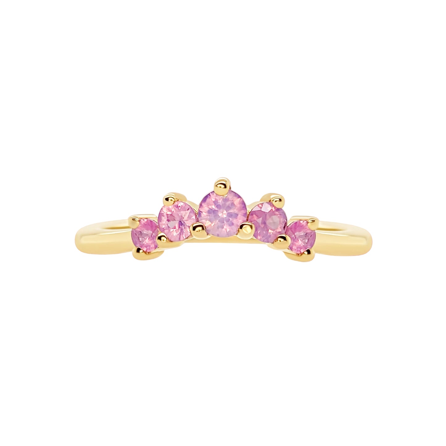 Gold ring with pink gemstones on a white background