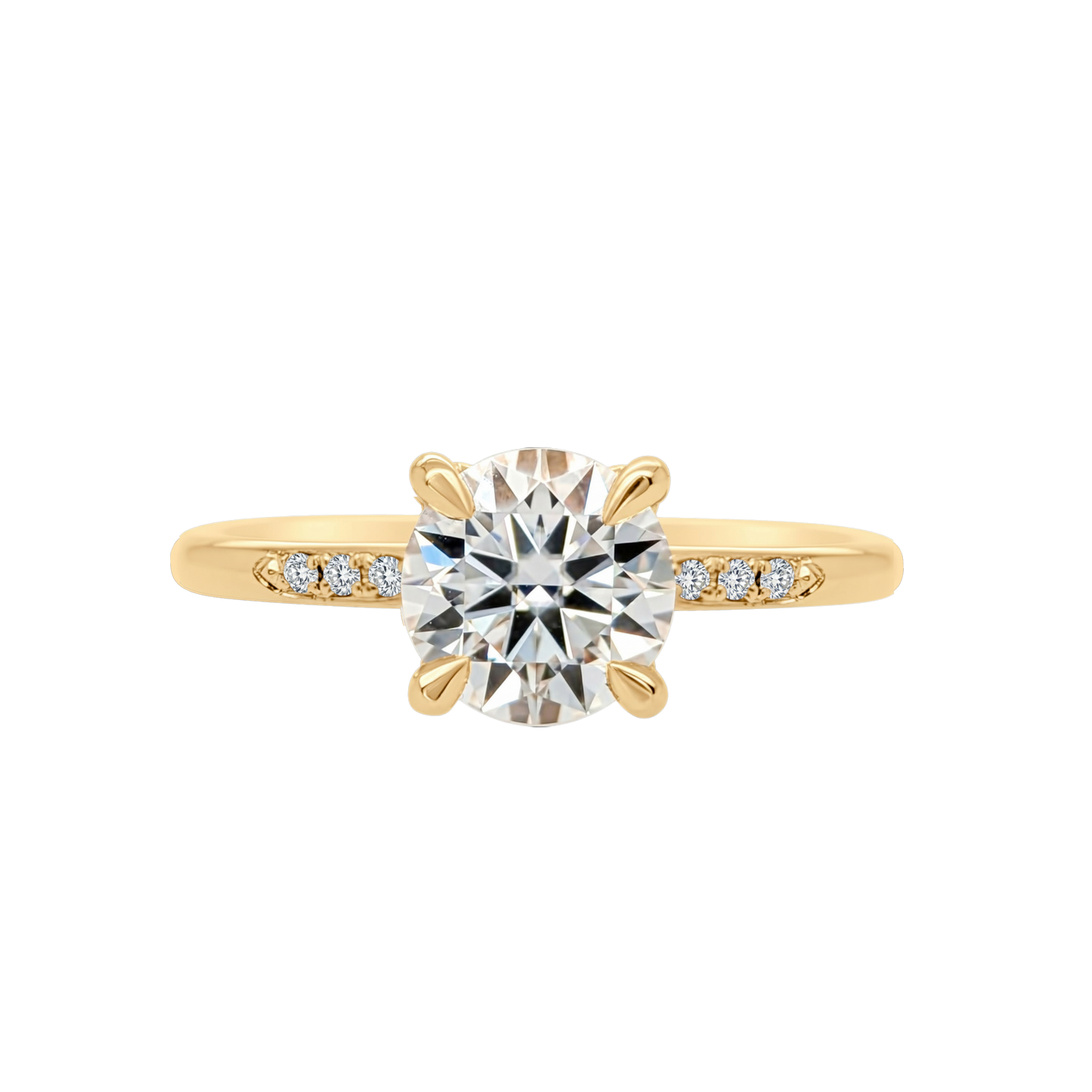Gold ring with a large diamond and smaller diamonds on the band against a white background