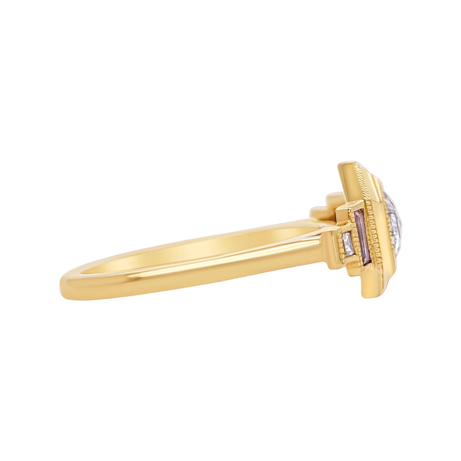 Gold ring with a diamond on a white background