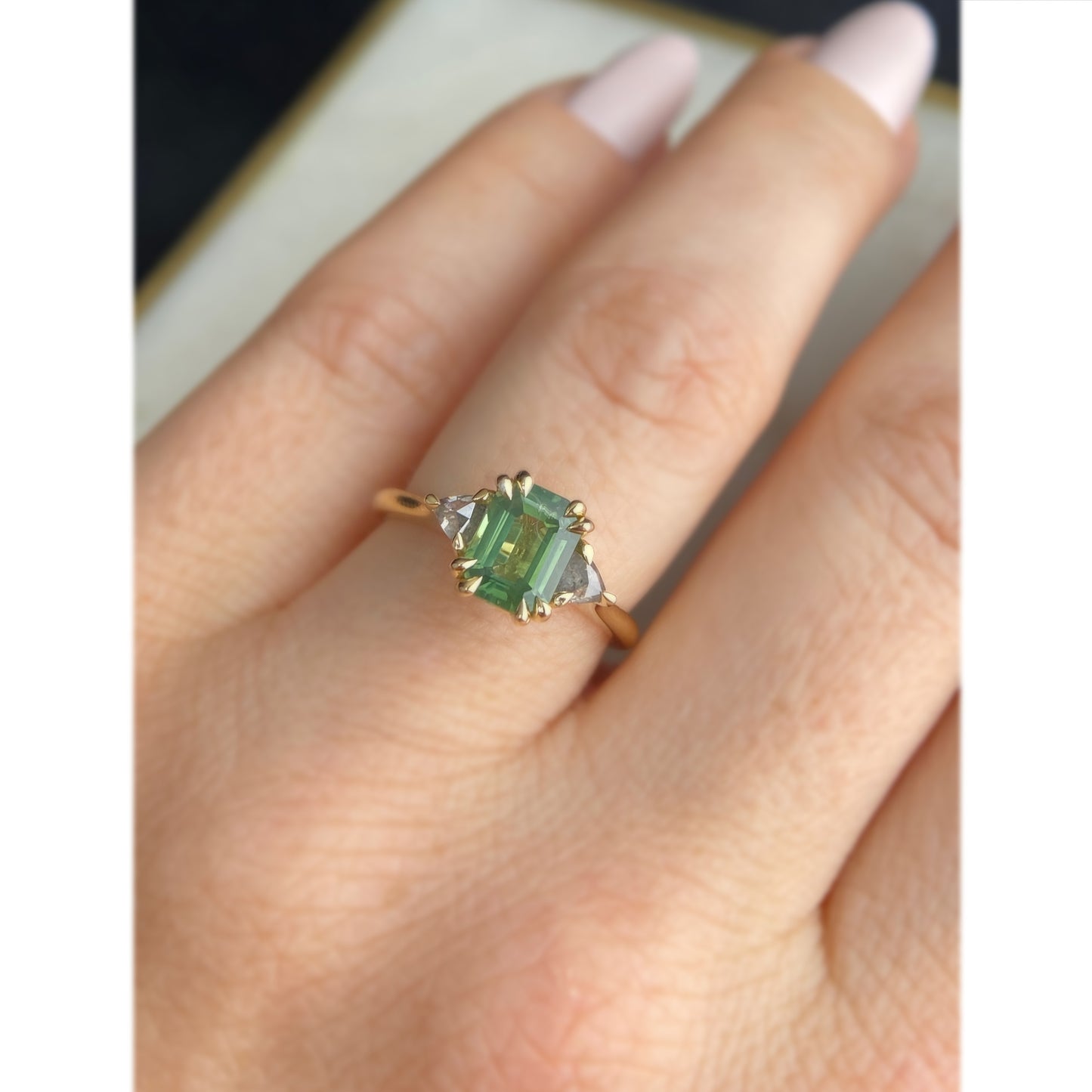 Emerald Cut Australian Green Sapphire with Salt and Pepper Trillion Diamond Accents Double Claw Engagement Ring 14K yellow gold